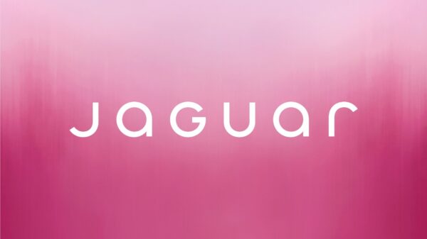 Jaguar letters shown in white on a pink ombre background.