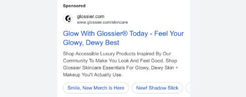 Sponsored Glossier skincare ad featuring a headline about glowing skin and promotional text highlighting community‑inspired products.